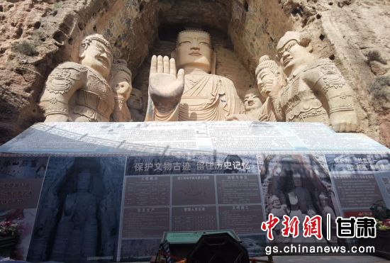 時下，中國“石窟鼻祖”天梯山石窟第13窟大佛足部與局部危巖體搶救性保護(hù)項(xiàng)目正在施工。圖為施工現(xiàn)場。陳曉斌 攝